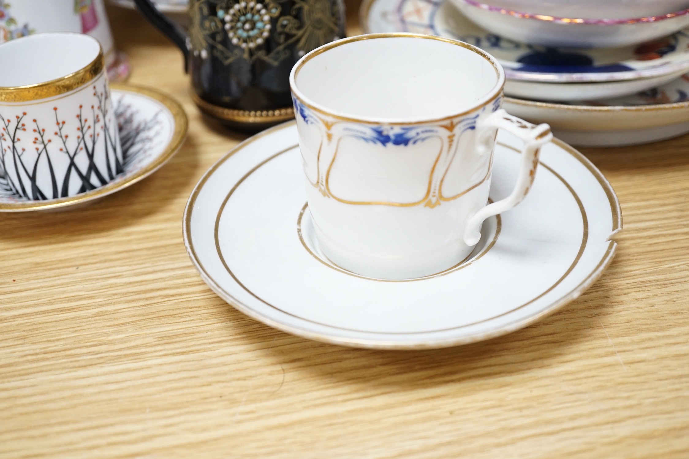 A large collection of mixed 19th century tea ware, a Staffordshire flat back, floral encrusted vase